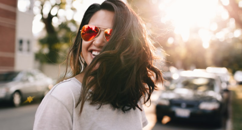 Woman smiling in street